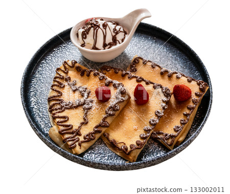 pancakes decorated with chocolate cut out 133002011