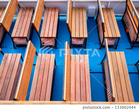 empty wooden benches on board of tour boat empty wooden benches on board of tour boat 133002044