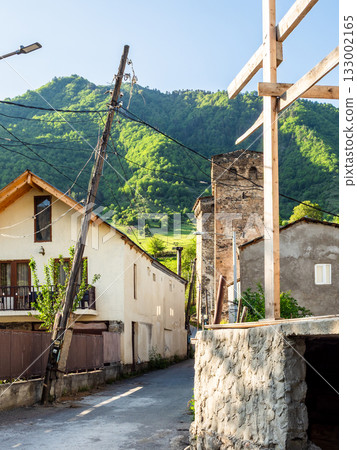 street with svan towers in Mestia town in summer 133002165