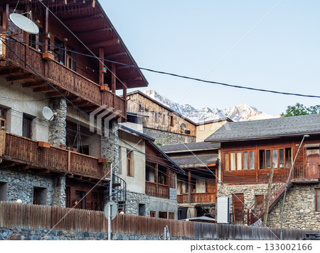 urban houses in Mestia town in summer evening 133002166