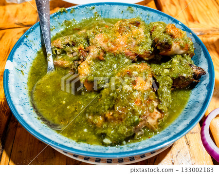 Georgian fried chicken stewed in tkemali sauce Georgian fried chicken stewed in tkemali sauce 133002183