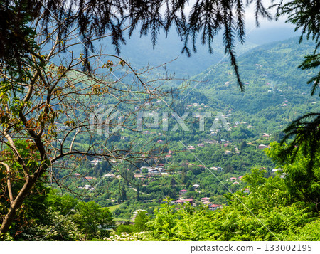 view of villiges on green slope from Erge mount 133002195