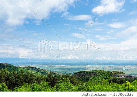 white clouds in blue sky over Alazani valley white clouds in blue sky over Alazani valley 133002322