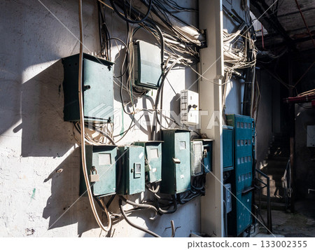 Electricity meters on wall in courtyard in Batumi 133002355