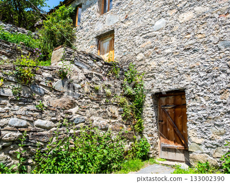 typical old stone residential house in Mestia town 133002390