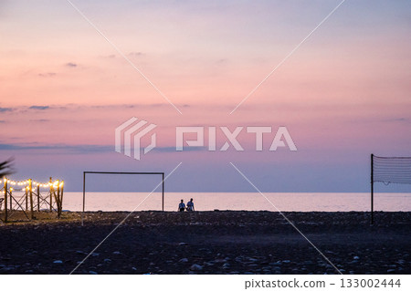 view of pink and blue evening sky over Black Sea 133002444