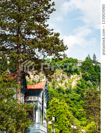 facade of apartment villa and station of cable car 133003060