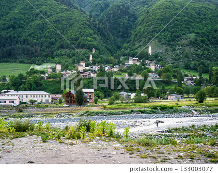 view of riverbed and Mestia townlet in evening view of riverbed and Mestia townlet in evening 133003077