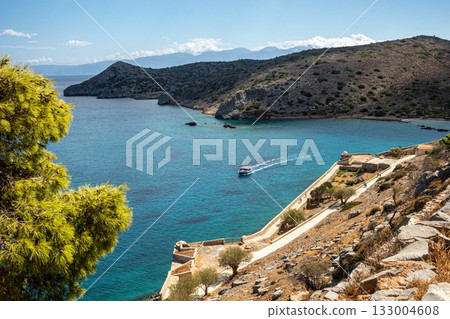 Spinalonga Venetian Fortress from above. Ship and Pristine Waters. 133004608
