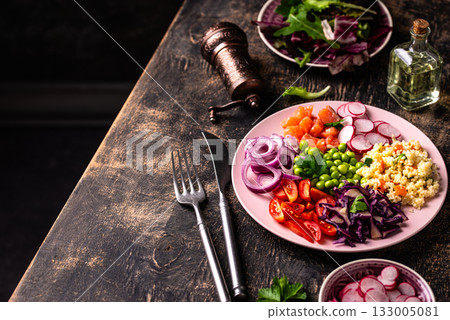 Balanced healthy bowl with vegetables and salmon 133005081