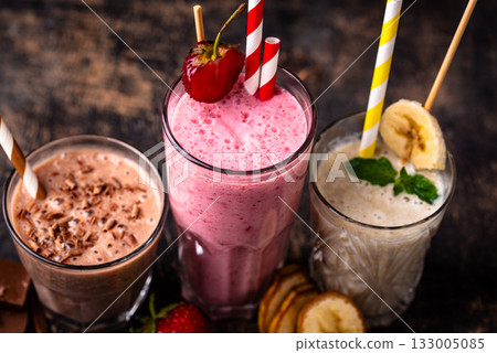 Milkshake from strawberry, banana and chocolate 133005085