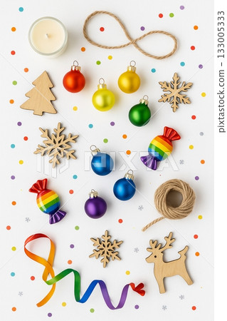 Festive Christmas Pride Flat Lay with Rainbow Ornaments, Pinecones, and Candles 133005333