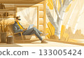 A man working remotely in a log cabin in autumn 133005424