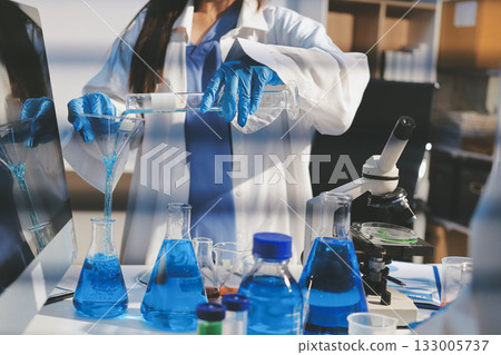 Researchers working in the clinical laboratory Researchers working in the clinical laboratory 133005737