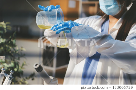 Researchers working in the clinical laboratory 133005739