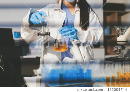 Researchers working in the clinical laboratory Researchers working in the clinical laboratory 133005744