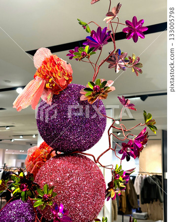 Elegant spring composition with bird and shiny balls 133005798