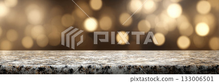 Brown marble surface with soft champagne bokeh light background in warm tones 133006501