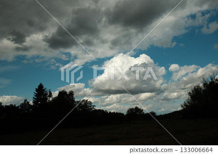 Dramatic cloudy sky with soft light tones Dramatic cloudy sky with soft light tones 133006664
