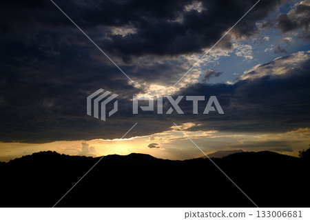 Dramatic cloudy sky with soft light tones Dramatic cloudy sky with soft light tones 133006681