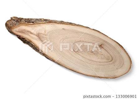 Cutting board made of wood cut with bark isolated on white background top view. 133006901
