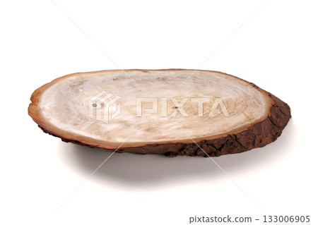 Wooden plate of oblong shape made from a tree cut isolated on white background. Wooden plate of oblong shape made from a tree cut isolated on white background. 133006905