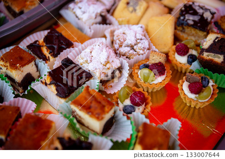 A Delicious and Inviting Assortment of Colorful and Exquisite Desserts and Pastries A Delicious and Inviting Assortment of Colorful and Exquisite Desserts and Pastries 133007644