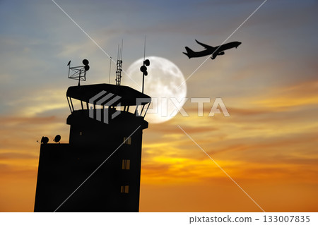 Air Traffic Control Tower at Airport As Airplane Takes Off. 133007835