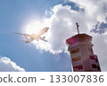 Air Traffic Control Tower at Airport As Airplane Takes Off. 133007836