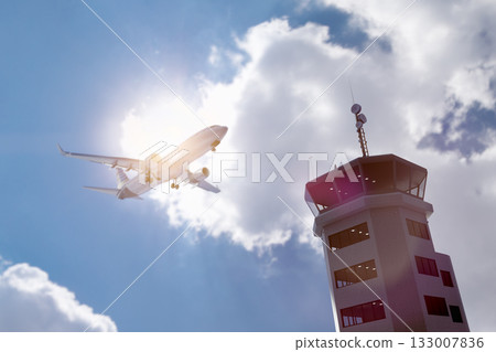 Air Traffic Control Tower at Airport As Airplane Takes Off. 133007836