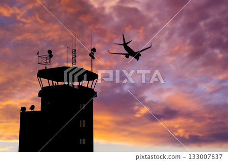 Air Traffic Control Tower at Airport As Airplane Takes Off. 133007837