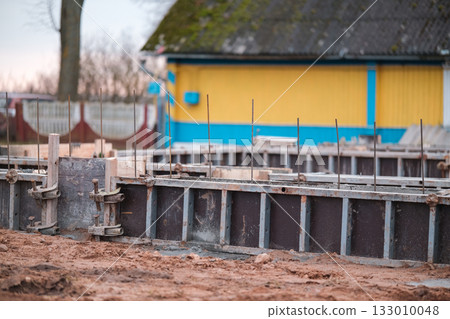 Construction of the foundation of a private house. High quality photo Construction of the foundation of a private house. High quality photo 133010048