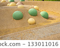 Playground hemispheres on sand beige rubber surface, safe EPDM play area 133011016