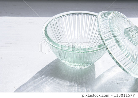 Glass container on the windowsill Glass container on the windowsill 133011577