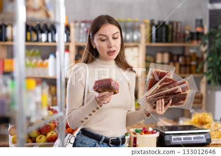 Girl choose hamon in store Girl choose hamon in store 133012646