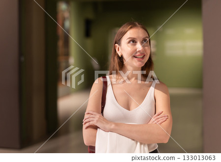 Woman with a smile in the museum 133013063