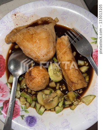 Pempek, a delicious Indonesian fishcake served with a tangy, sweet-sour vinegar sauce. Perfect for food photography and showcasing traditional Indonesian street food, rich in flavor and texture. Pempek, a delicious Indonesian fishcake served with a tangy, sweet-sour vinegar sauce. Perfect for food photography and showcasing traditional Indonesian street food, rich in flavor and texture. 133013105