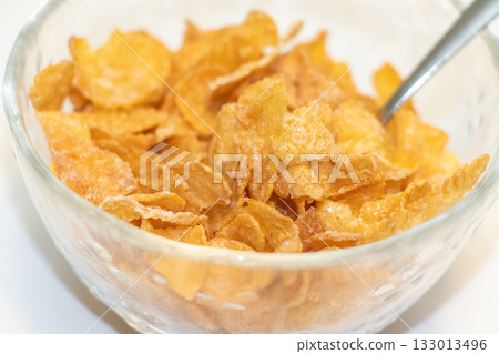 Corn flakes in a bowl Corn flakes in a bowl 133013496