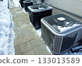 Outdoor HVAC units in winter snow 133013589