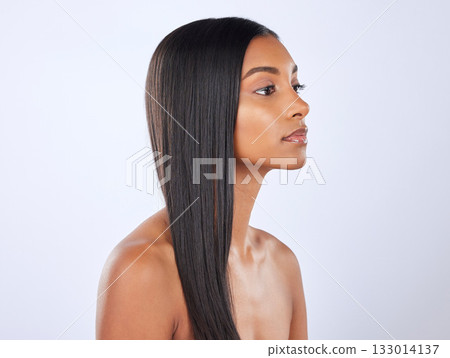 Woman, straight hair and beauty, cosmetic care and keratin treatment with haircare on studio background. Serious, Indian female with hairstyle and skin glow, Brazilian and cosmetics with growth Woman, straight hair and beauty, cosmetic care and keratin treatment with haircare on studio background. Serious, Indian female with hairstyle and skin glow, Brazilian and cosmetics with growth 133014137