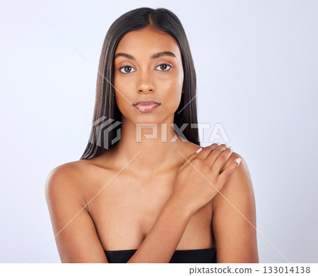 Woman, hair and beauty in portrait, cosmetic care and keratin treatment with haircare on studio background. Serious, Indian female with hairstyle and skin glow, Brazilian and cosmetics with growth 133014138