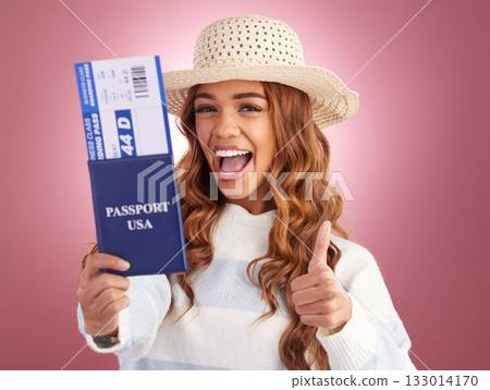 Portrait, thumbs up and woman with USA passport, thumbs up and ready for travel with smile on a pink studio background. Face, female tourist and traveler with gesture for agreement, documents and joy 133014170