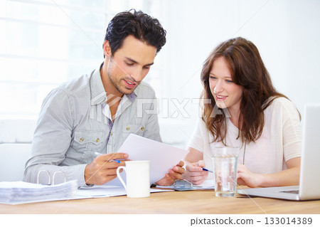 Documents, planning and business people or partner in meeting collaboration, teamwork or financial review. Startup man and woman with paperwork talking, feedback or advice on finance, taxes or profit Documents, planning and business people or partner in meeting collaboration, teamwork or financial review. Startup man and woman with paperwork talking, feedback or advice on finance, taxes or profit 133014389