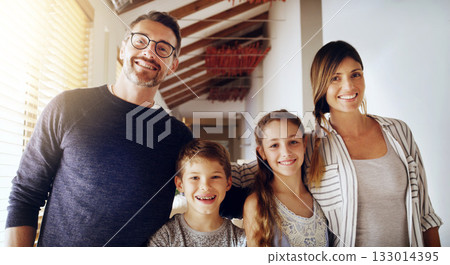 Portrait, children and parents as a homeowner family moving house for a new start after real estate purchase. Mom, dad and kids with a group of people in the living room of their property investment Portrait, children and parents as a homeowner family moving house for a new start after real estate purchase. Mom, dad and kids with a group of people in the living room of their property investment 133014395