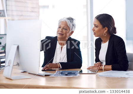 Mentor, coaching or business women with computer talking, speaking or planning a project in office. Technology, teamwork collaboration or senior manager explaining to an intern for digital training 133014438