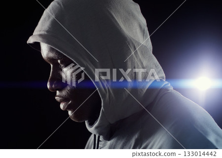 Fitness, night and face of black man with focus in city for workout, exercise and marathon training. Sports, strong and profile of male athlete with dedication, motivation and serious for running 133014442