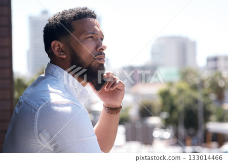 Serious, black businessman and call on a cellphone in a city or standing outside talking or office overlooking on bokeh. Communication, face and corporate professional on mobile or conversation Serious, black businessman and call on a cellphone in a city or standing outside talking or office overlooking on bokeh. Communication, face and corporate professional on mobile or conversation 133014466