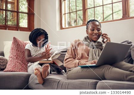 Black woman, phone call and laptop with child in home with book on a computer with remote work. Happy, kid and mobile connection of a girl reading with mama in a conversation from freelancer job Black woman, phone call and laptop with child in home with book on a computer with remote work. Happy, kid and mobile connection of a girl reading with mama in a conversation from freelancer job 133014490