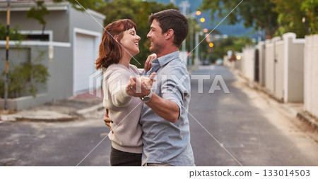 Dance, street and a happy couple having fun together outdoor while bonding in their domestic neighborhood. Love, road or residential with a man and woman bonding while dancing outside for freedom Dance, street and a happy couple having fun together outdoor while bonding in their domestic neighborhood. Love, road or residential with a man and woman bonding while dancing outside for freedom 133014503