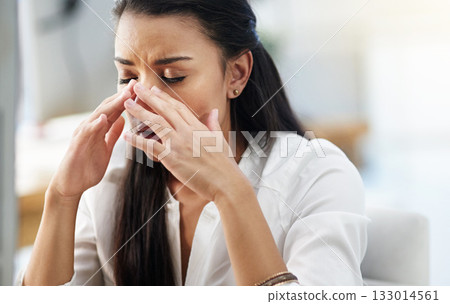 Office, burnout or woman with headache, stress or tired in workplace with fatigue, anxiety or depression. Stressed employee, sad female consultant or business person with migraine pain or frustrated 133014561
